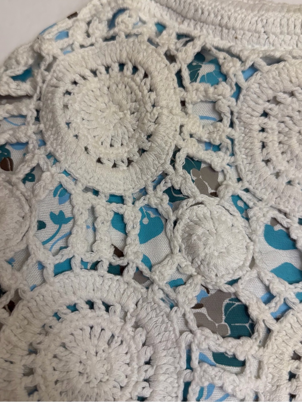 Lilu White Crochet Purse with teal and‎ gray floral underlay Bamboo Handles. - Picture 7 of 10